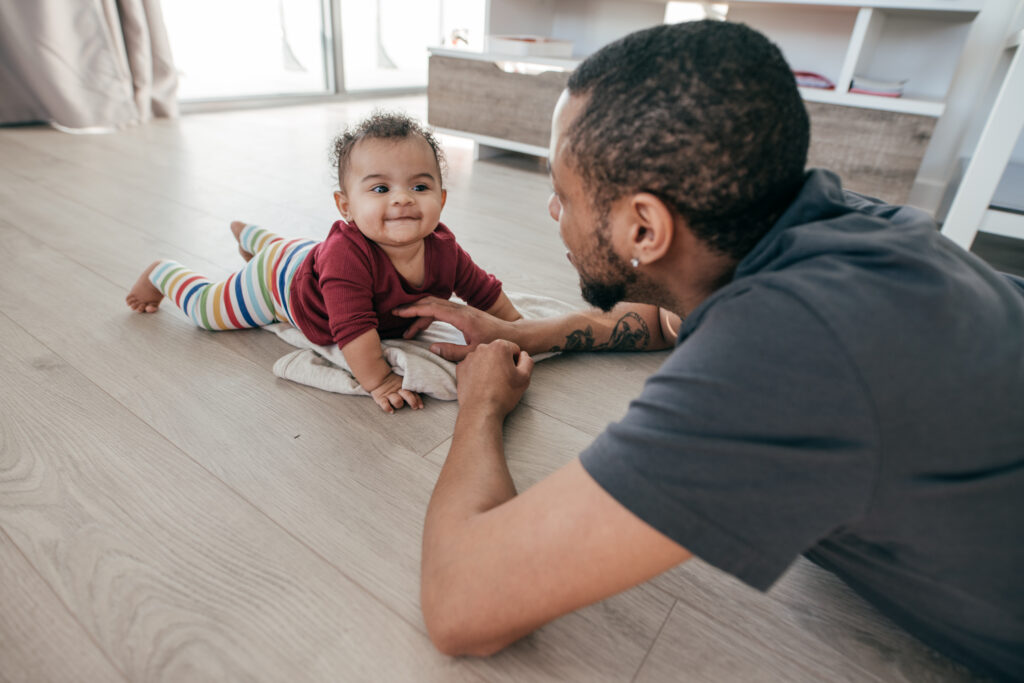 Teaching a child how to crawl